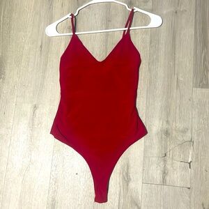 Red womens bodysuit.